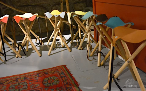 Wood and leather chair in Mercado 48 shop