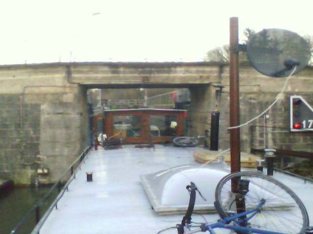 Passing a lock with the river boat in the north of France