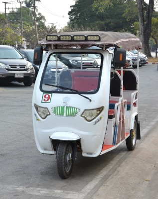 electric Tuktuk to discover the world cultural heritage Sukhothai historical park