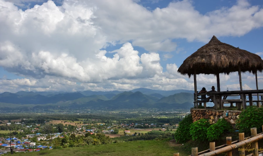 A viewpoint in northern Thailand with the river valley and mountain landscape