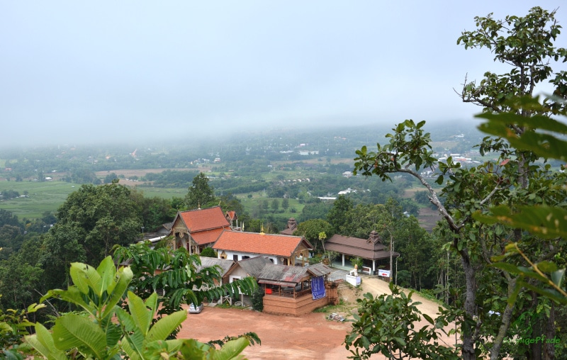 Temple Wat Mae Yen near Pai in northern Thailand with morning mist over the Pai valley