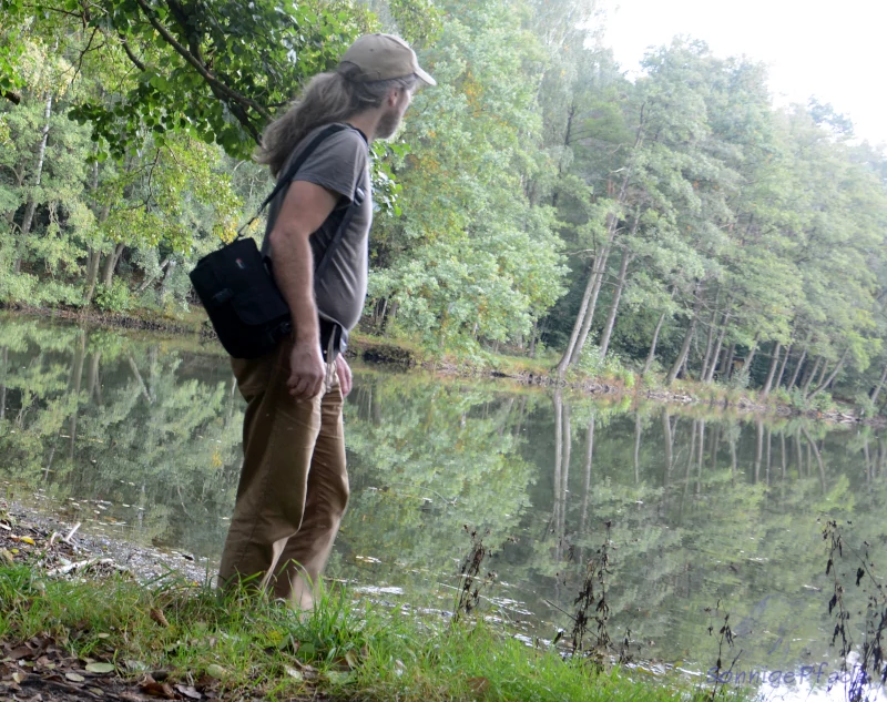 Outdoor with camera bag in the nature