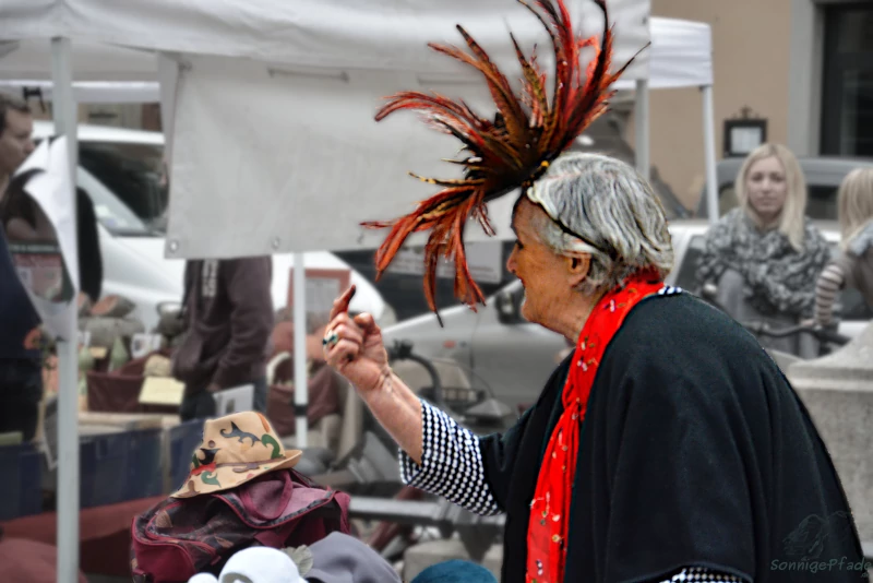 Florence in Italy: A hatter at the local market Santo Spirito