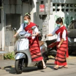 Thai ladies use a scooter in Chiang Mai