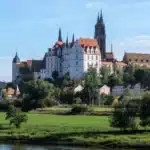 Sights in East German Saxony: View from the Elbe river meadows to the Meissen Cathedral and Albrechtsburg castle hill